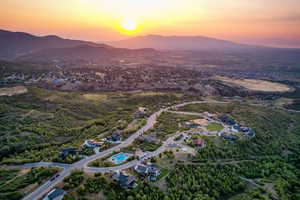 Birds eye view of property with a mountain view