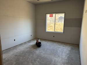 Spare room with concrete floors