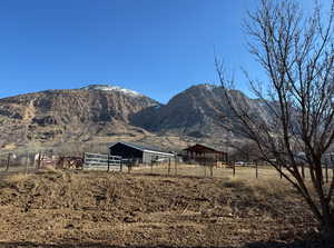 Property view of mountains featuring a rural view