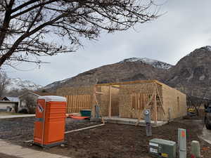 View of playground featuring a mountain view