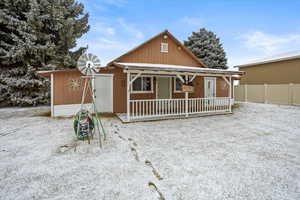 View of front of home featuring covered porch