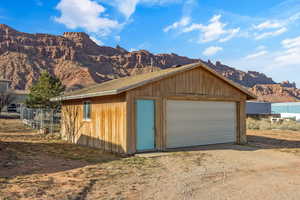 Garage featuring a mountain view