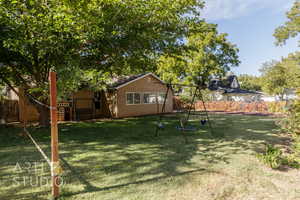 View of yard featuring a playground