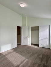 Bedroom 2 upstairs featuring carpet and a closet