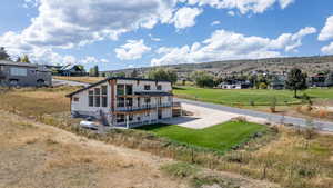 View showing how home is adjacent to Golf Course and extra space if you want to build a detached shop.