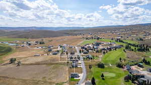 Aerial view of home and golf course