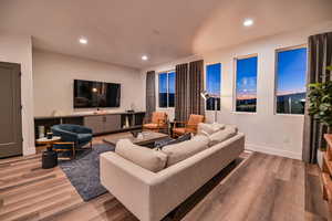 Pics are of model home.Living room with wood-type flooring