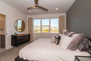 Pics are of model home.Bedroom featuring ceiling fan, light colored carpet, and a mountain view