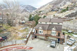 Birds eye view of property with a mountain view