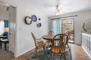 Dining room featuring ceiling fan and light hardwood / wood-style floors