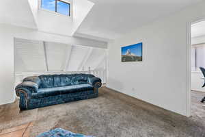 Living room with carpet floors