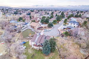 Aerial view at dusk featuring a mountain view