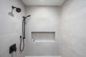 Bathroom with tiled shower