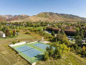 Birds eye view of property featuring a mountain view