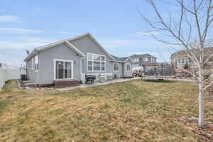 Rear view of house with a patio area