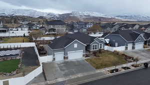 Birds eye view of property featuring a mountain view