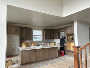 Kitchen featuring backsplash and a kitchen island