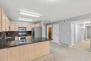 Light filled with  neutral gray painted walls.  White ceilings, base and trim for an upgraded look.