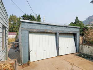 Garage featuring a mountain view