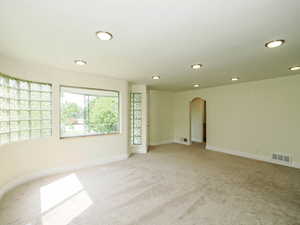 View of carpeted spare room