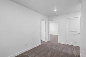 View of carpeted spare room