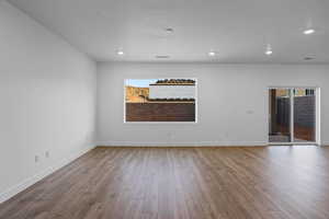 Unfurnished room with wood-type flooring