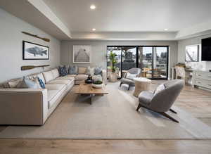 Living room with light wood-type flooring