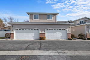 View of front property with a garage