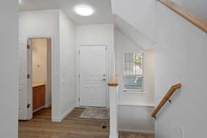 Entryway with wood-type flooring