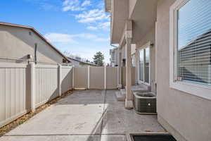 View of patio featuring central AC