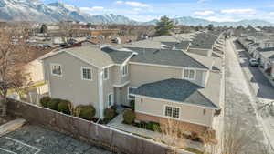 Birds eye view of property with a mountain view