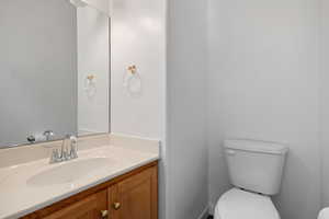 Bathroom with vanity and toilet