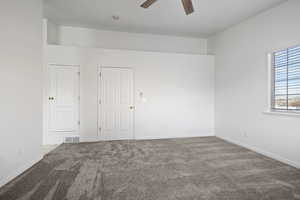 Unfurnished room with carpet flooring and ceiling fan