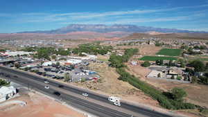 Drone / aerial view featuring a mountain view