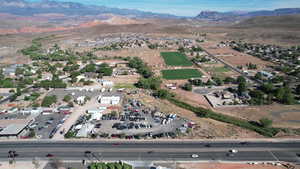 Birds eye view of property featuring a mountain view