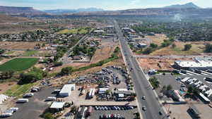 Birds eye view of property with a mountain view