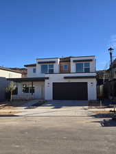 View of front of home with a garage