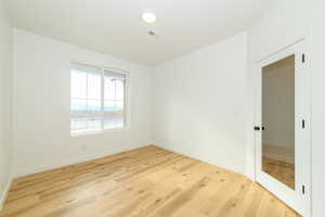 Spare room featuring light hardwood / wood-style floors