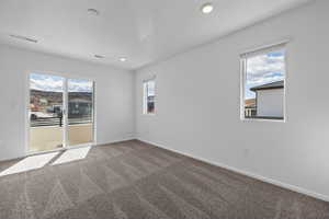 Unfurnished room featuring carpet