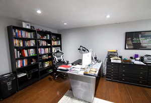 Office space featuring dark hardwood / wood-style floors