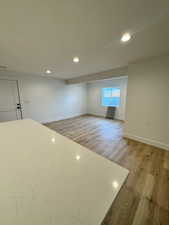 Unfurnished room featuring light wood-type flooring