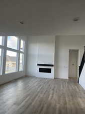 Unfurnished living room featuring light hardwood / wood-style floors