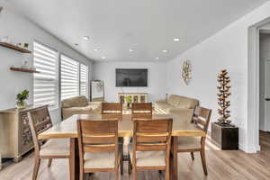 Dining area featuring light wood-type flooring