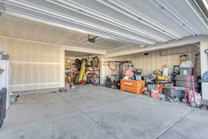 Garage featuring a garage door opener