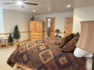 Large Primary bedroom with large private bath, bedroom opens to deck facing Bear Lake.