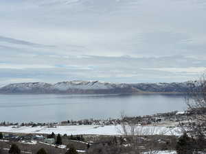 View of water feature with a mountain view