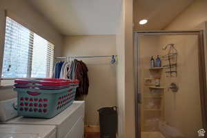 Laundry room with a shower