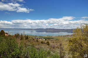 Water view with a mountain & lake view