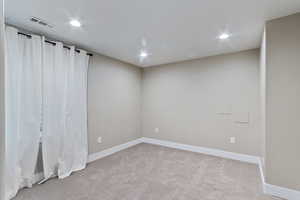 View of carpeted spare room