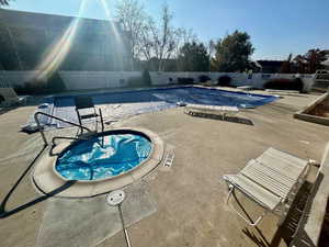 View of swimming pool featuring a patio